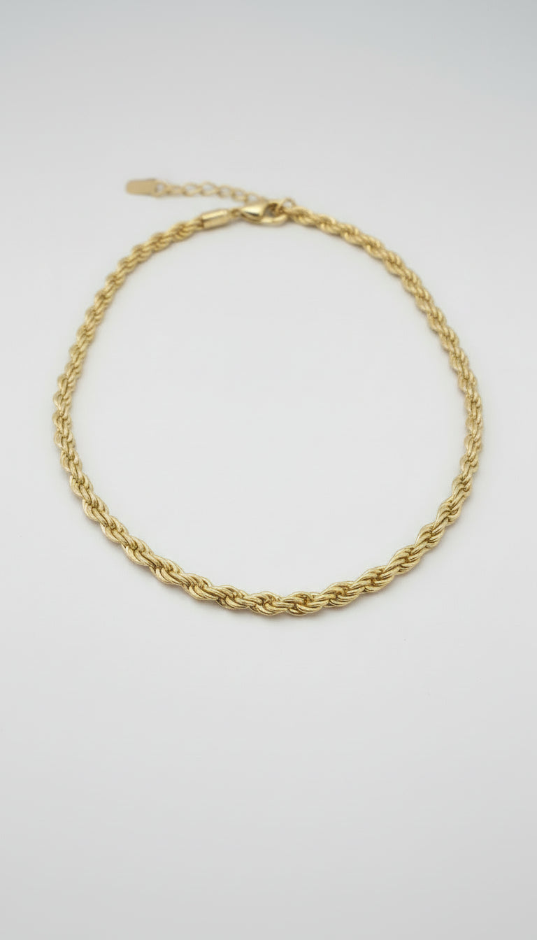 Gold chain on a dark background